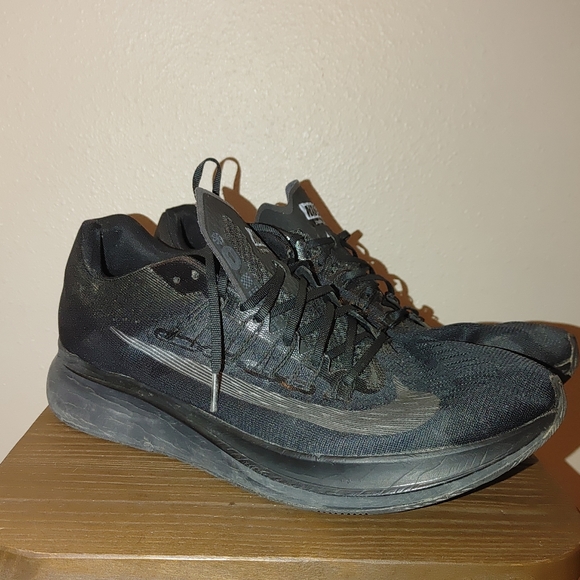 nike zoom fly triple black